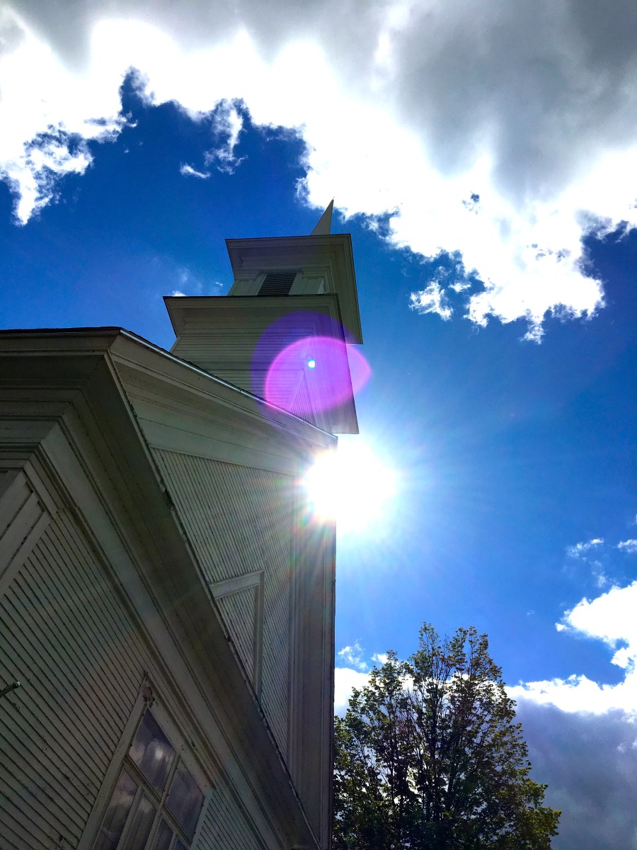 church stepple against the blue sky