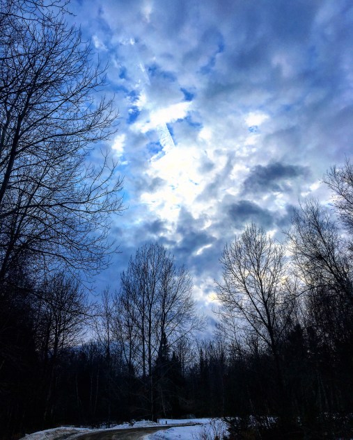 clouds converging in the sky