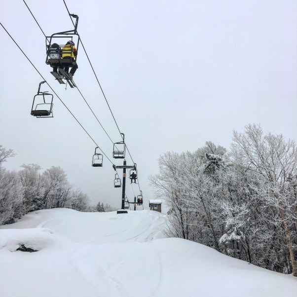 chairlift headed up the mountain in Vermont