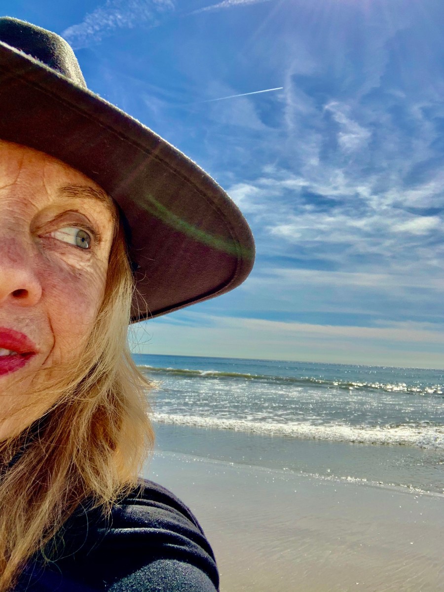 woman in a hat on the Santa Monica beach