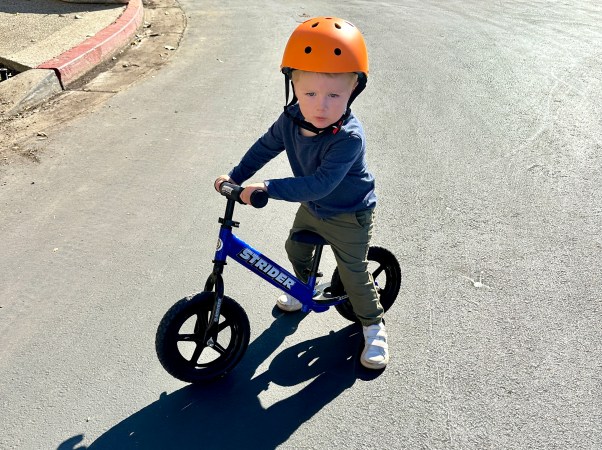 young boy on a bike