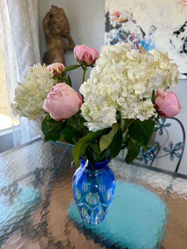 summer flowers in a blue vase