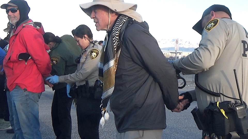 man getting arrested for protesting nuclear testing site in Nevada