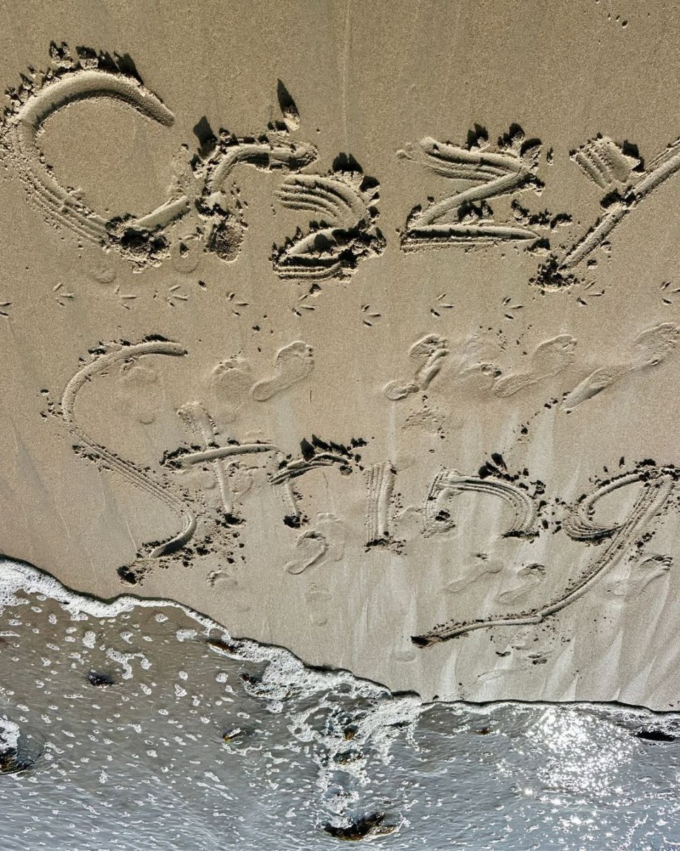 Crazy String written in the sand