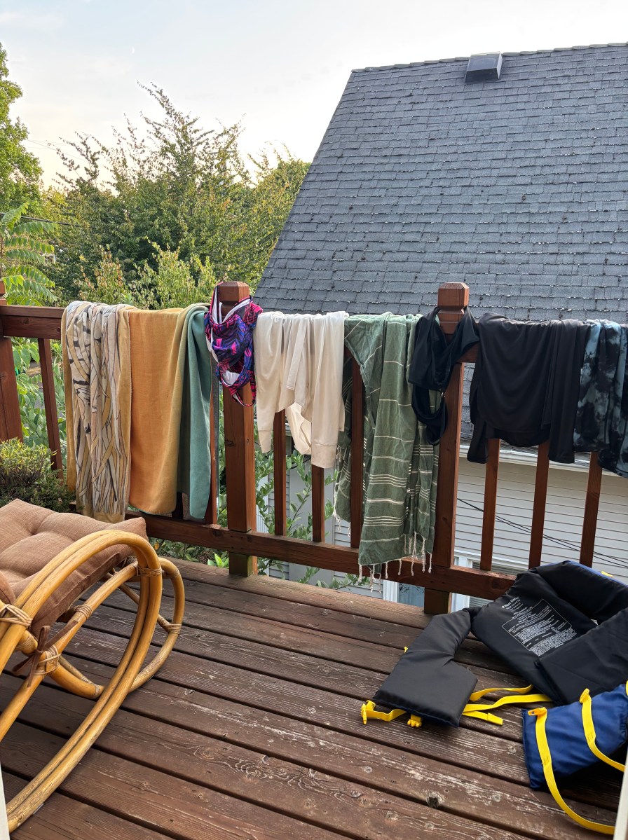 towels hanging over the deck railing